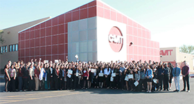 Large group poses in front of CAVIT