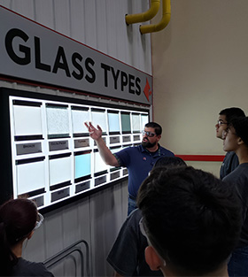 Students listening to a work describe types of glass